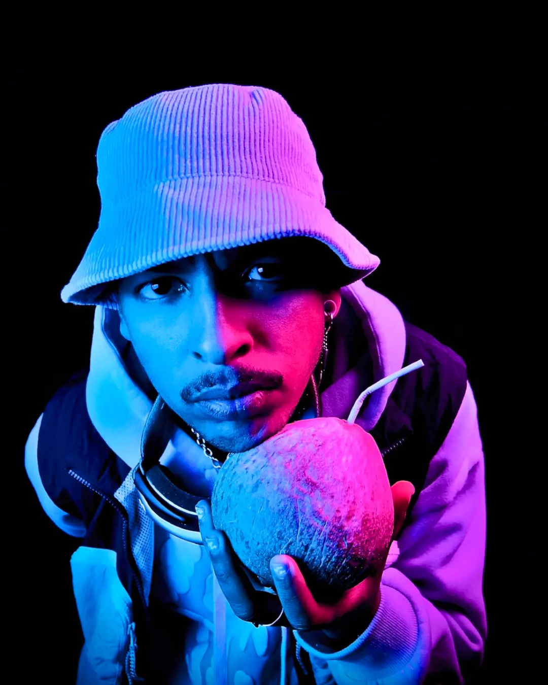 purple lighting and a croud of people